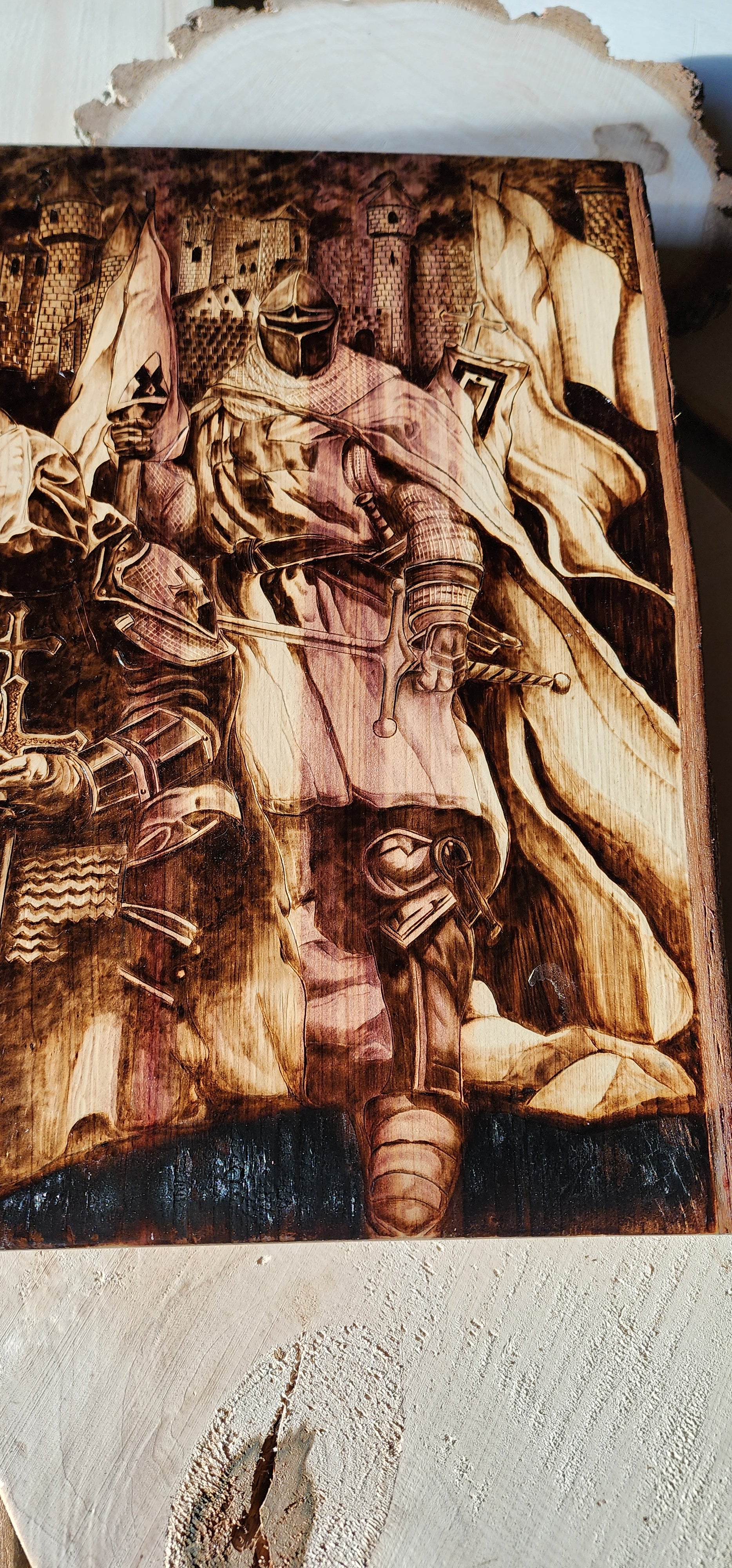 custom wood burned art of a knight by burnt blessings studio