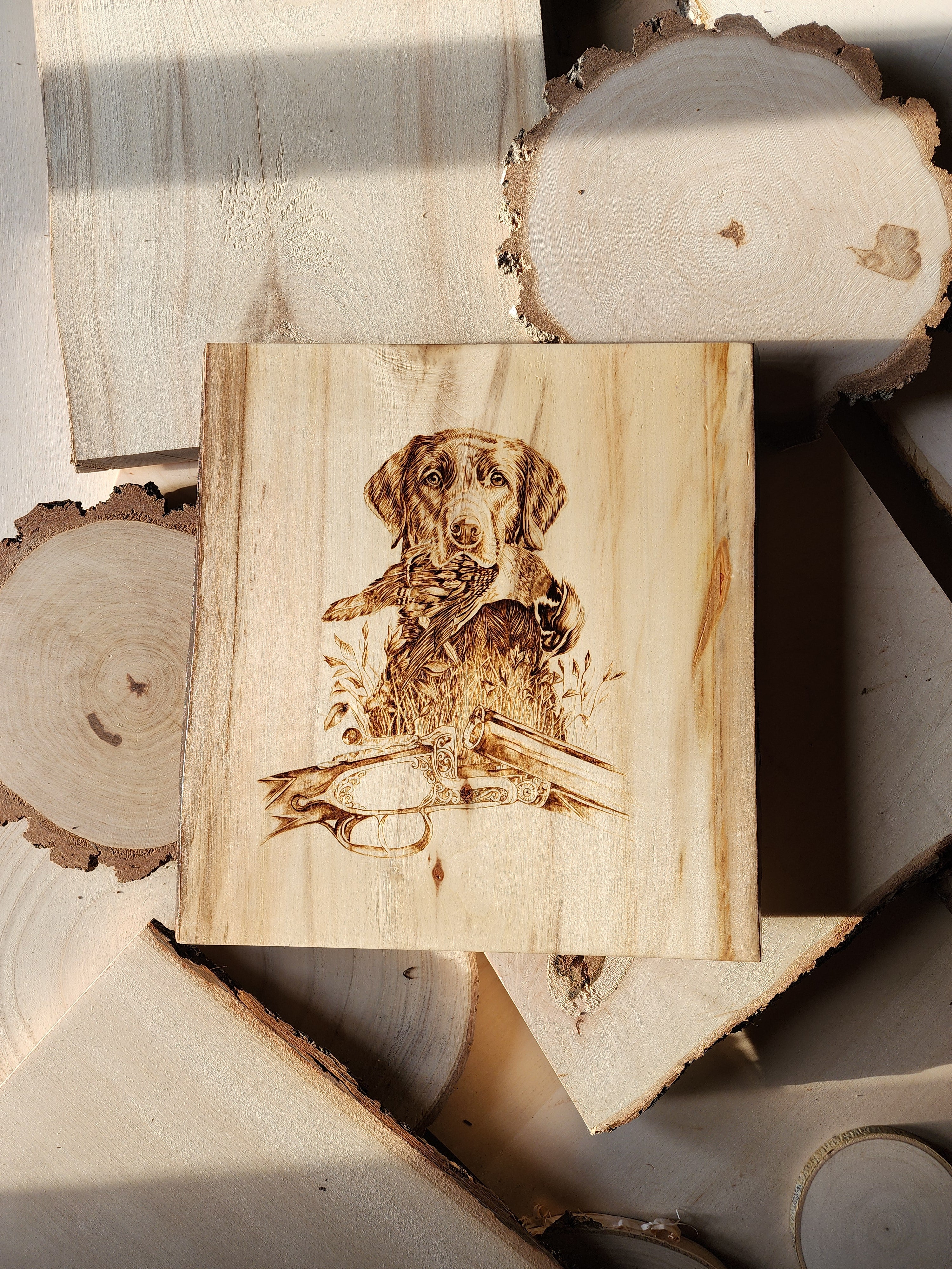 wetland hunt by burnt blessings studio, a pyrographic art piece of a hunting dog