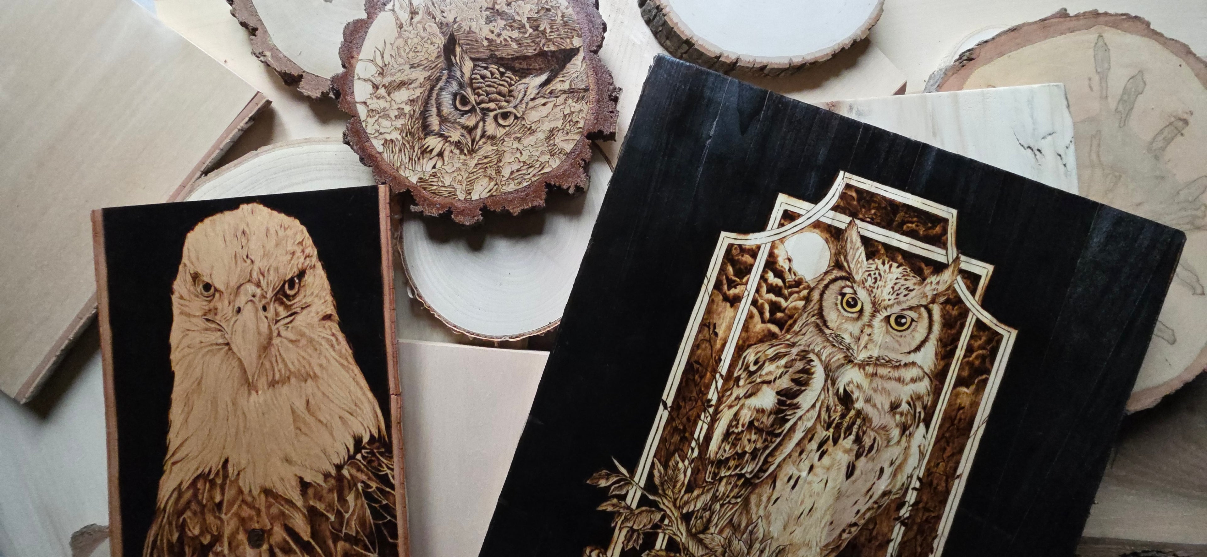 flat lay of wood burned art from burnt blessings studio