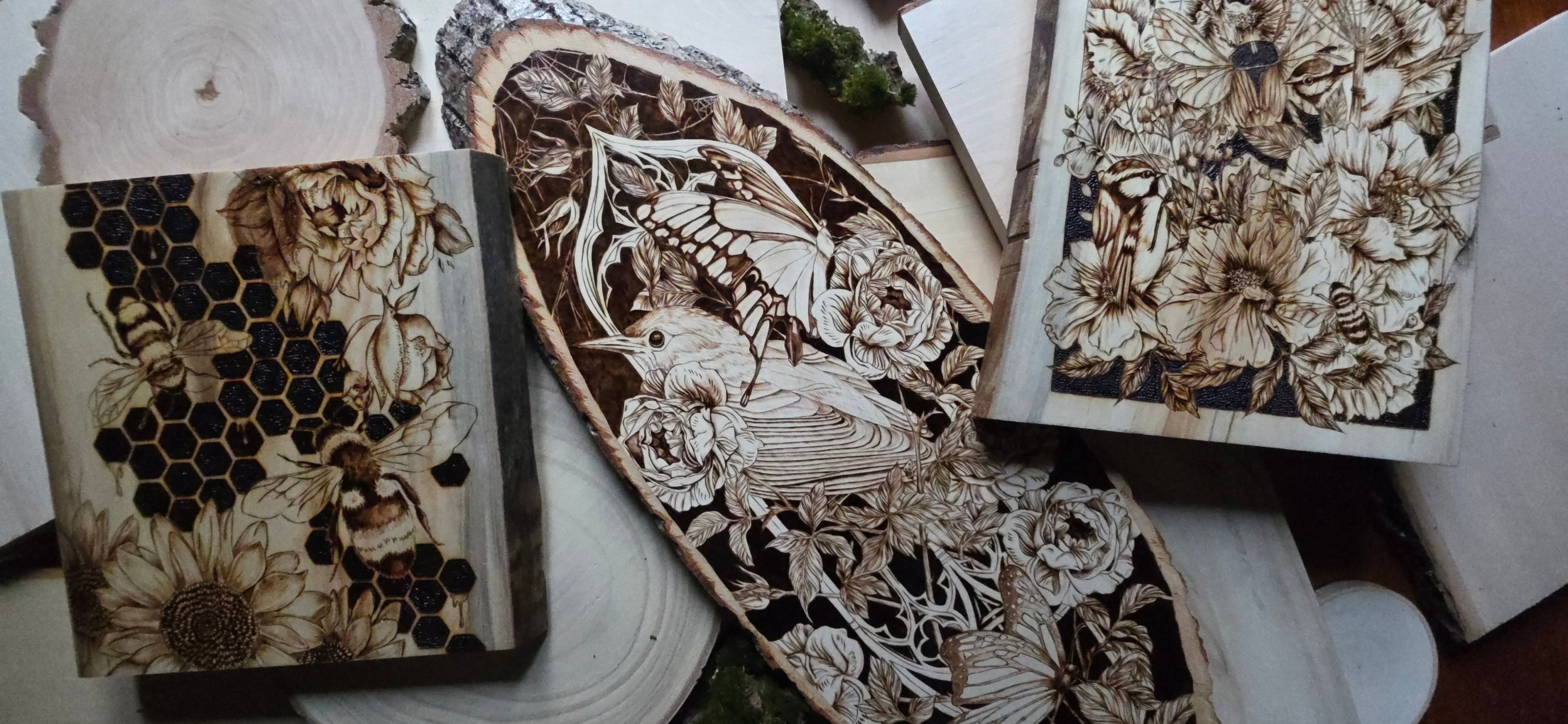 flat lay of wood burned art from burnt blessings studio